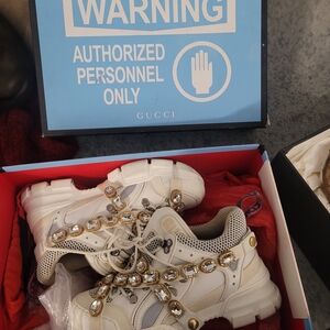 Gucci White Sneakers with Gold Embellishments